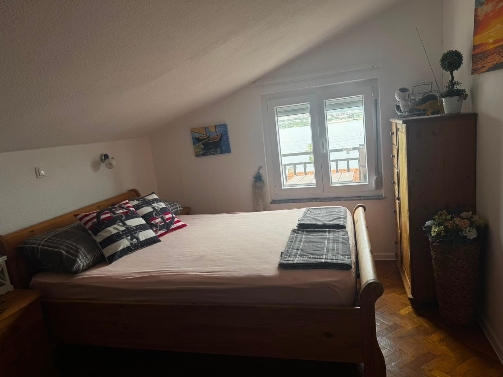 Bedroom 2 with wooden bed